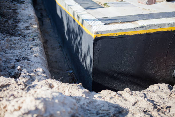 Professional Waterproofing technician working in Perry, MI